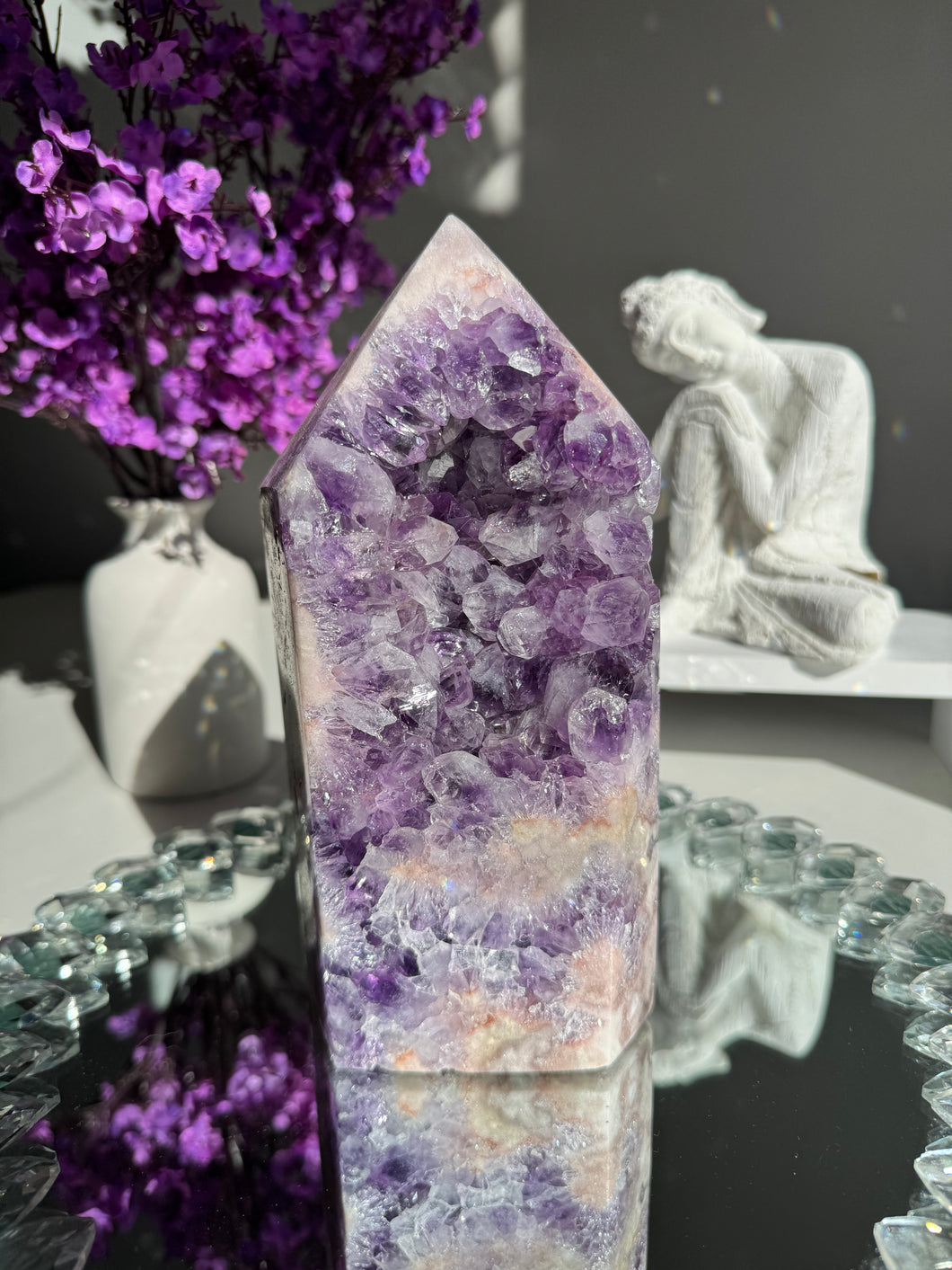 Pink amethyst with amethyst tower