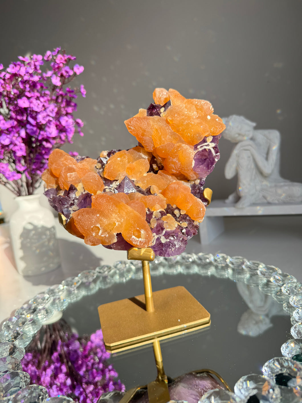 Amethyst cluster with orange calcite