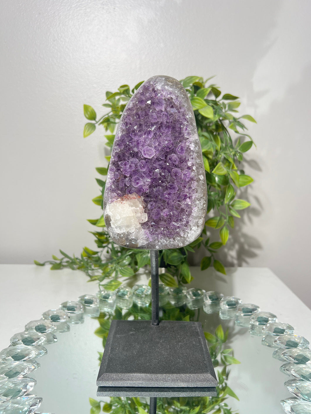 Amethyst with calcite on metal stand   1660